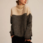 Beige and black herringbone turtleneck sweater with wide stripe yoke