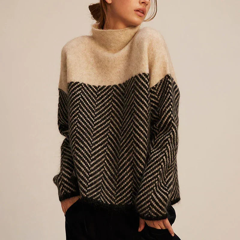 Beige and black herringbone turtleneck sweater with wide stripe yoke