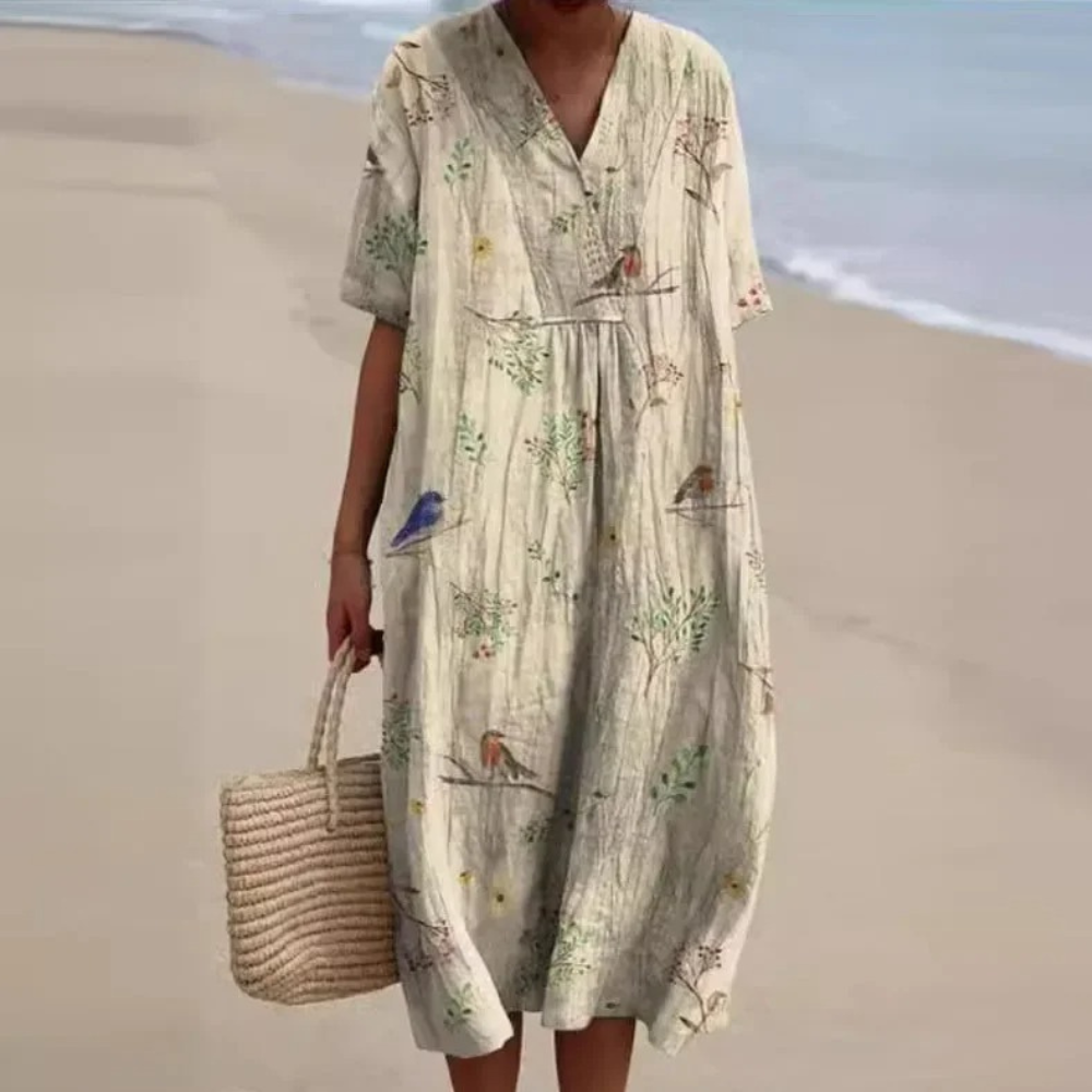 Light beige midi dress with V-neck and short sleeves, botanical print and gathered waist