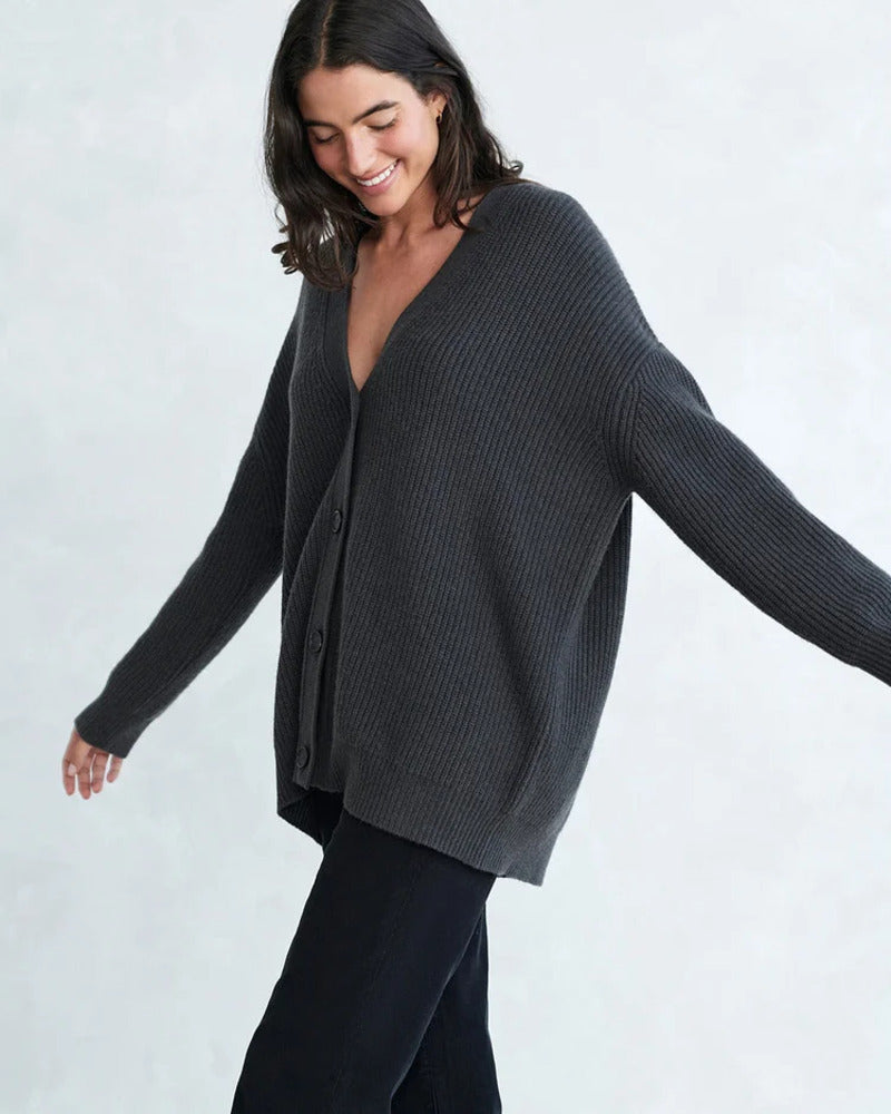 Cozy knit button-front cardigan in dark charcoal with V-neck and long sleeves