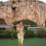 Light gold strapless satin evening dress with sweetheart neckline and long column hem