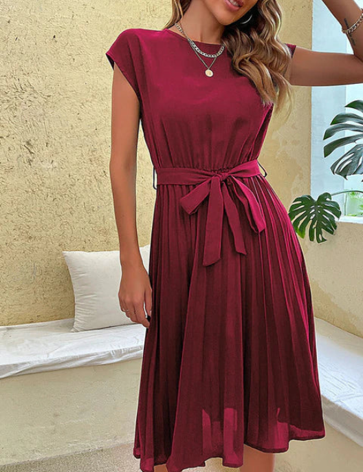 Burgundy pleated midi dress with tied waist and short sleeves