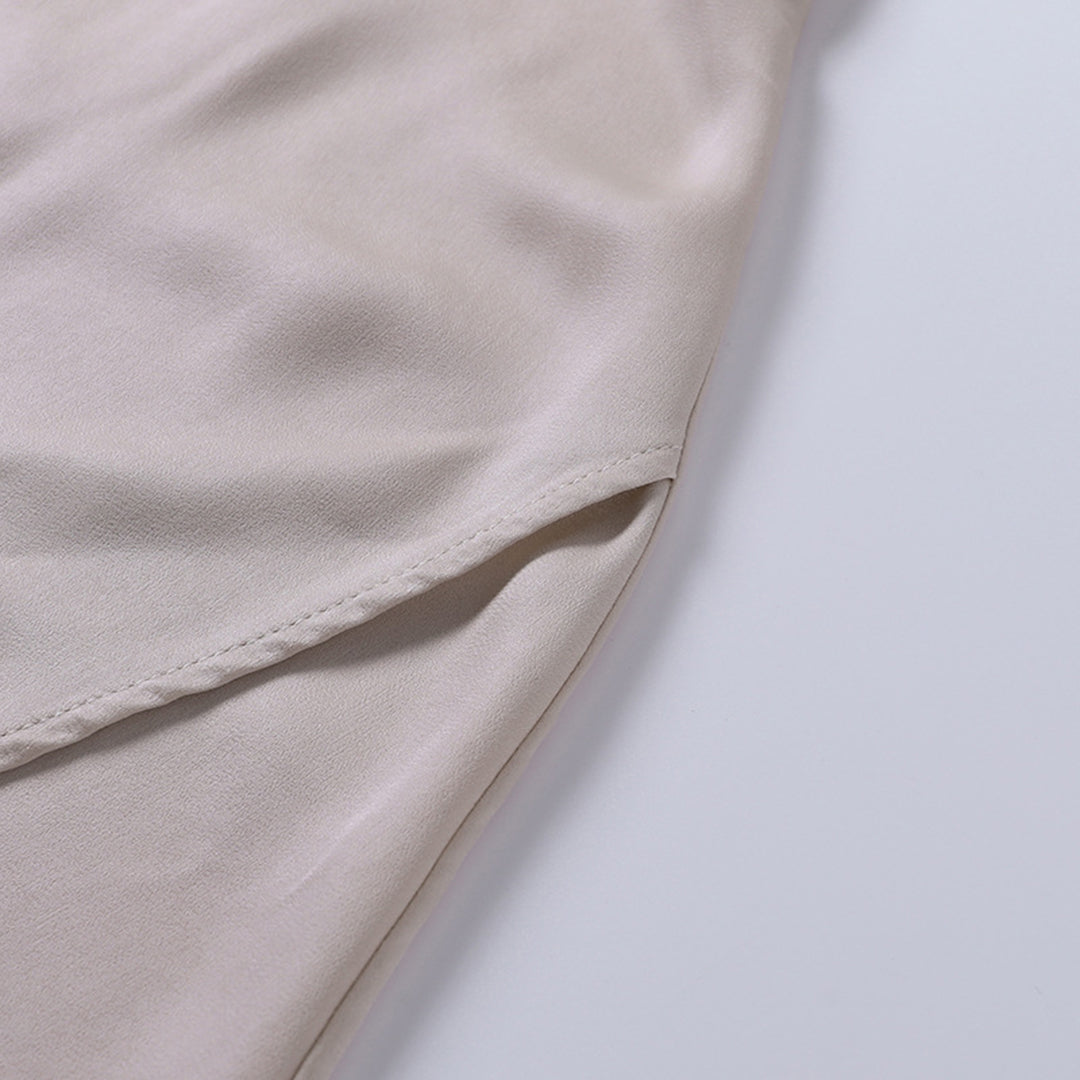Athena™ beige dress fabric with side seam close-up