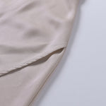 Athena™ beige dress fabric with side seam close-up