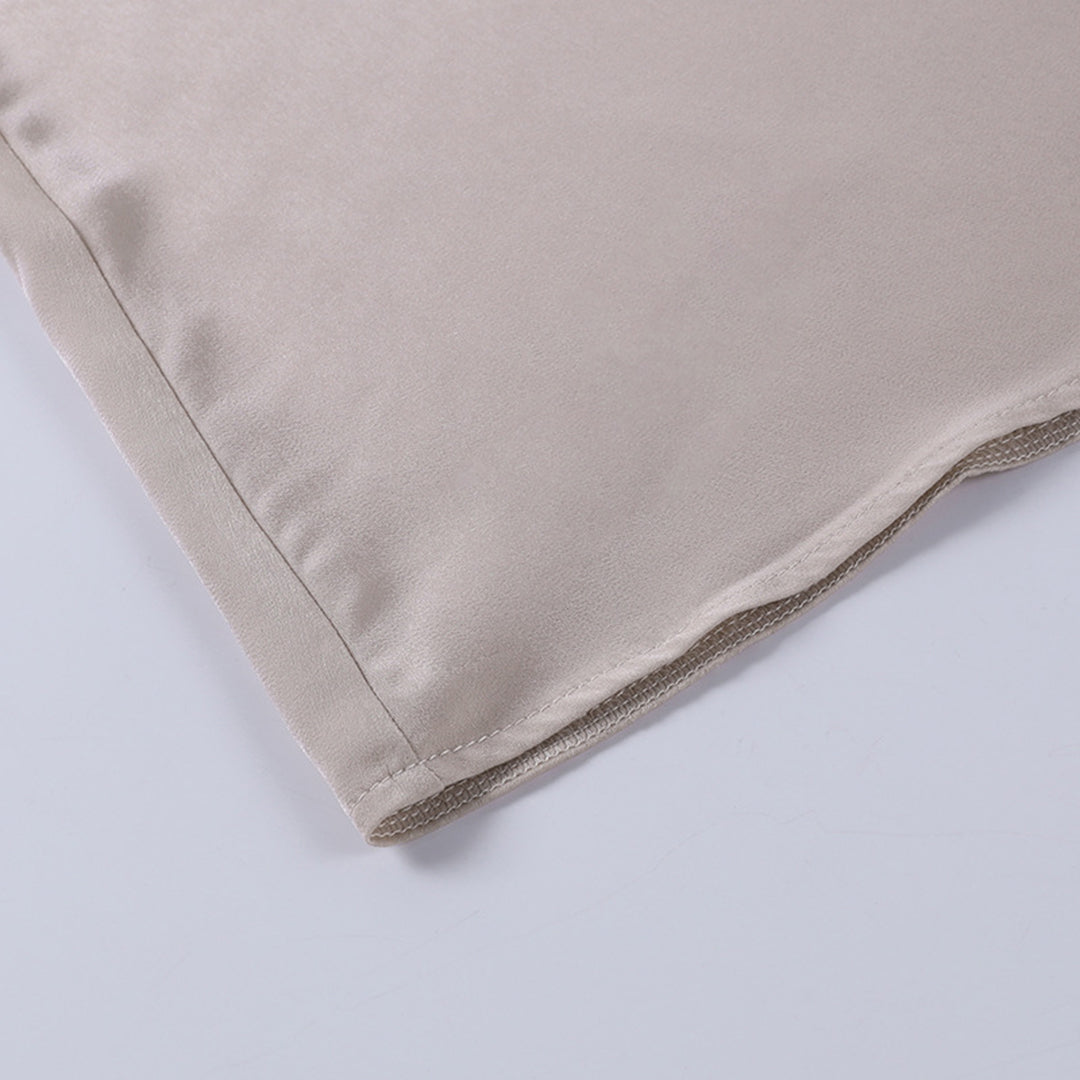 Athena™ beige dress hem detail with stitched edge