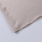 Athena™ beige dress hem detail with stitched edge