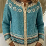 Blue knit cardigan with button-front, fair-isle yoke, and long sleeves