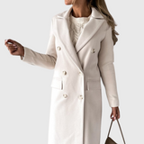 Off-white double-breasted overcoat with notch lapels, long sleeves, and buttoned cuffs