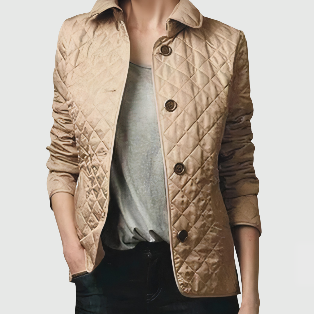 Beige quilted jacket detail with dark buttons and two chest pockets