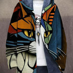 Hooded full-zip cardigan with bold abstract face artwork and dark sherpa-lined hood