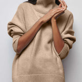Beige/taupe turtleneck sweater with chunky ribbed collar and cuffs