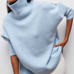 Light blue turtleneck sweater with ribbed collar and cuffs