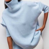 Light blue turtleneck sweater with ribbed collar and cuffs