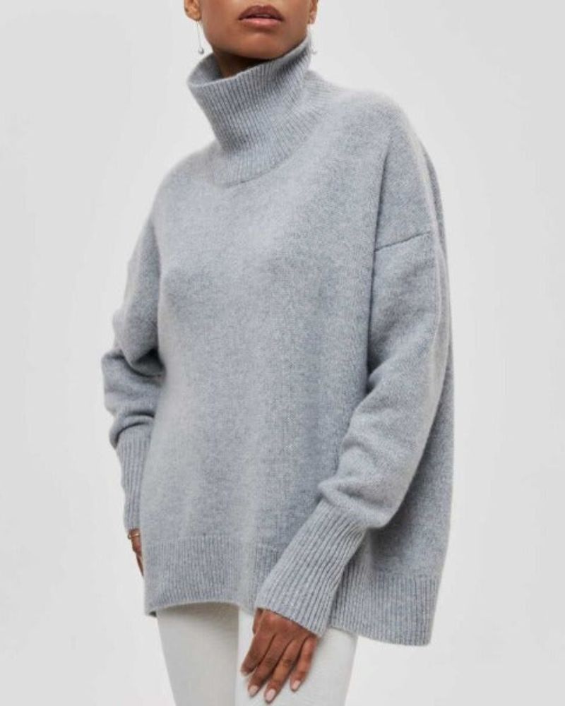 Heather gray turtleneck sweater with ribbed cuffs and high neckline