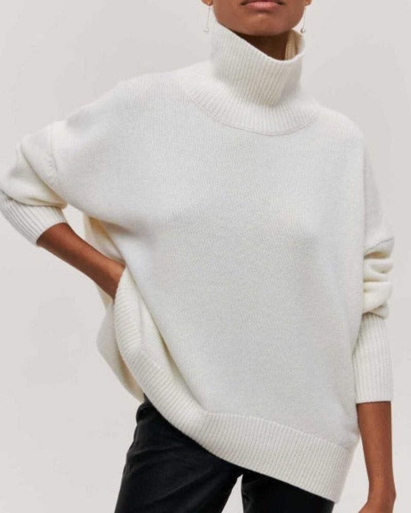 Ivory/white turtleneck sweater with ribbed collar and cuffs