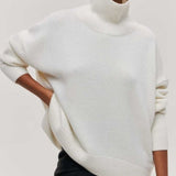 Ivory/white turtleneck sweater with ribbed collar and cuffs