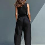 Minimalistischer Damen-Jumpsuit mit Stehkragen, Knopfleiste und lässiger, lockerer Passform