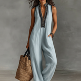 Minimalistischer, ärmelloser Damen-Jumpsuit mit Reißverschluss und Stehkragen, verziert mit Stickereien
