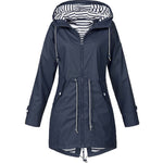 Navy zip-up hooded parka jacket with striped lining, front pockets, and drawstring hem