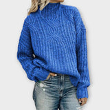 Blue cable-knit cozy sweater with mock neck and long sleeves