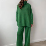 Green knit turtleneck sweater and wide-leg pants set, side view with relaxed drape