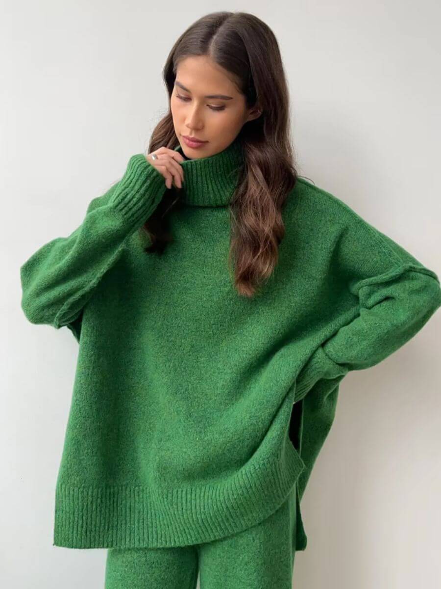 Green knit turtleneck sweater with chunky ribbed collar and long sleeves