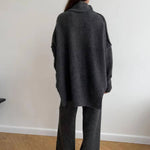 Dark gray knit turtleneck sweater and wide-leg pants set, back view showing collar