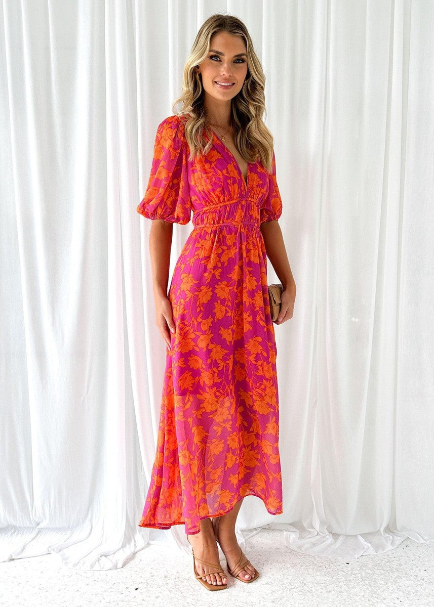 Pink-orange floral midi dress, short puff sleeves, gathered waist, front view