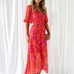 Pink-orange floral midi dress, short puff sleeves, gathered waist, front view