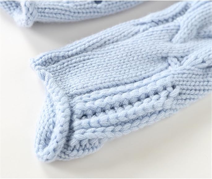 Light blue cable-knit pullover cuff and hem with ribbed edge