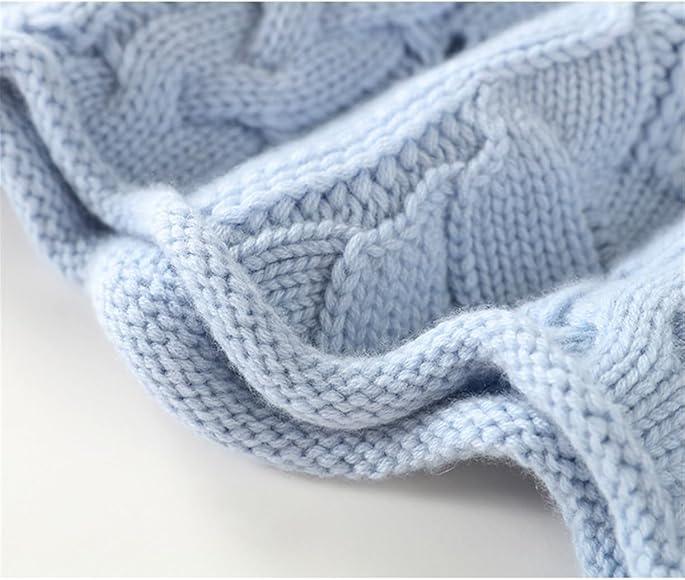 Light blue cable-knit pullover sleeve with textured knit and ribbed cuff