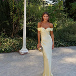 Light gold strapless satin evening dress with sweetheart neckline and fitted column silhouette