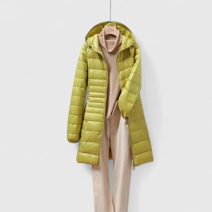 Hooded puffer jacket with long sleeves and front zipper, yellow-green colorway.