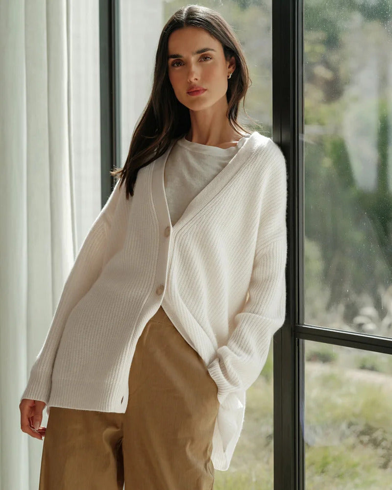 Cozy knit button-front cardigan in off-white with V-neck and long sleeves