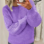 Purple chunky knit pullover with long sleeves and crew neck, textured stitch detail