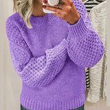Purple chunky knit pullover with long sleeves and crew neck, textured stitch detail