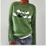 Green knit sweater with sheep intarsia on crew neck, long sleeves