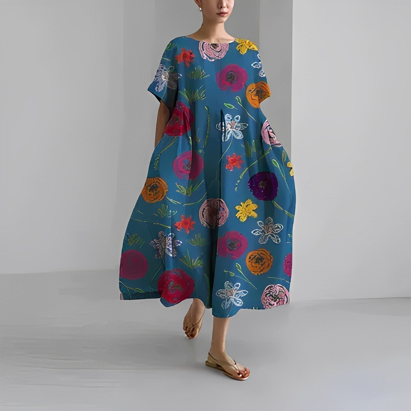 Women's floral dress, dark blue base with colorful floral and bug print, midi length