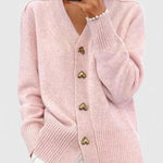 Pink cardigan with V-neck, long sleeves, ribbed cuffs and hem, gold button placket