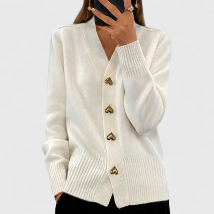 White cardigan with V-neck, long sleeves, ribbed cuffs and hem, gold button placket