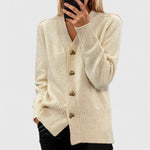 Beige cardigan with V-neck, long sleeves, ribbed cuffs and hem, gold button placket