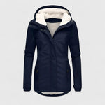 Navy hooded winter jacket with faux fur trim, zip front, and buttoned pockets