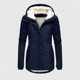 Navy hooded winter jacket with faux fur trim, zip front, and buttoned pockets