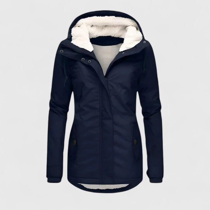 Navy hooded winter jacket with faux fur trim, zip front, and buttoned pockets