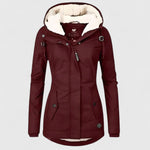 Burgundy hooded winter jacket with faux fur trim, front zipper, and buttoned side pockets