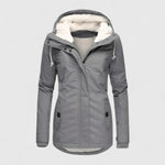 Gray hooded winter jacket with faux fur trim, front zipper, and side button pockets
