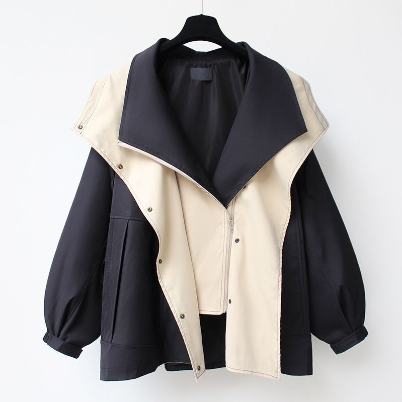 Windproof weatherproof jacket in dark navy with cream hood lining and snap front