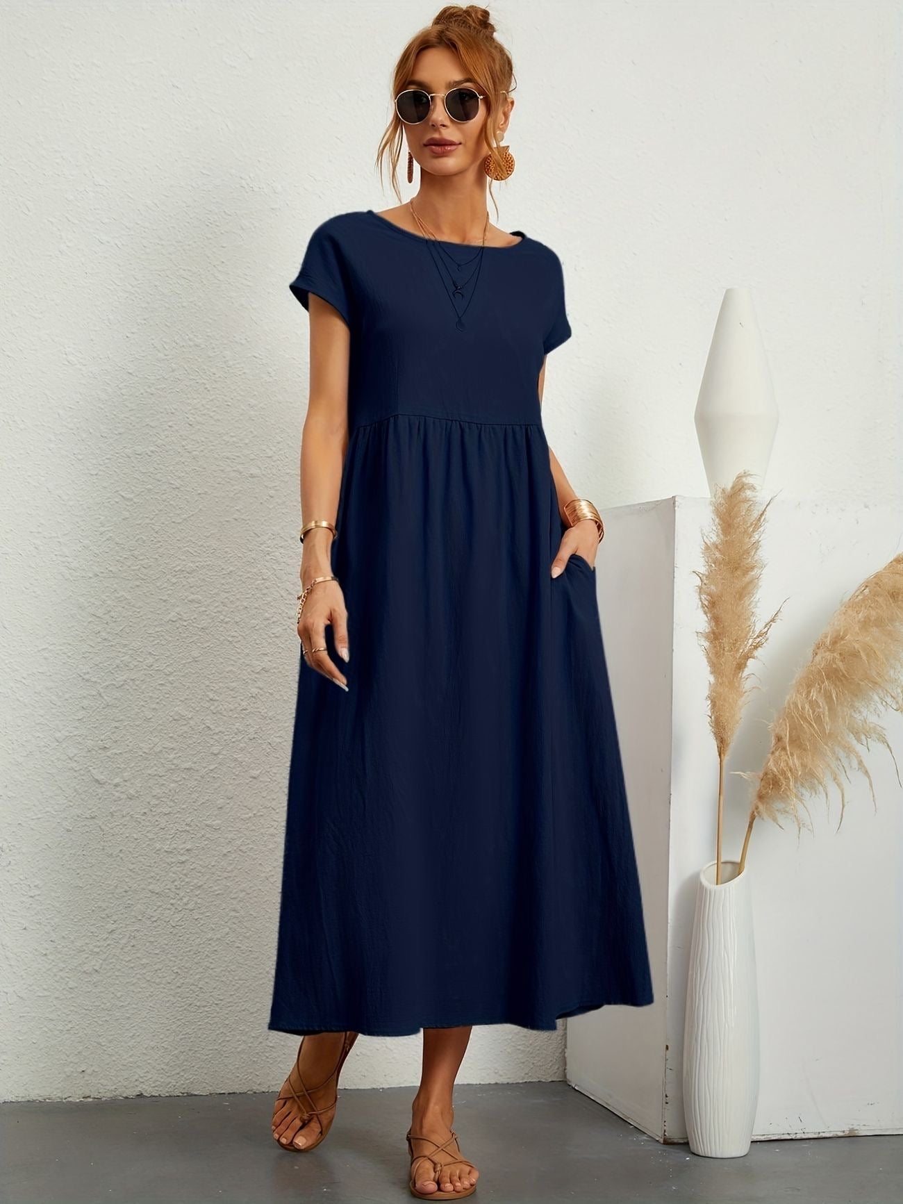 Navy midi casual dress with short sleeves and gathered waist, front view