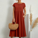 Rust orange midi casual dress with short sleeves and gathered waist, loose flared skirt