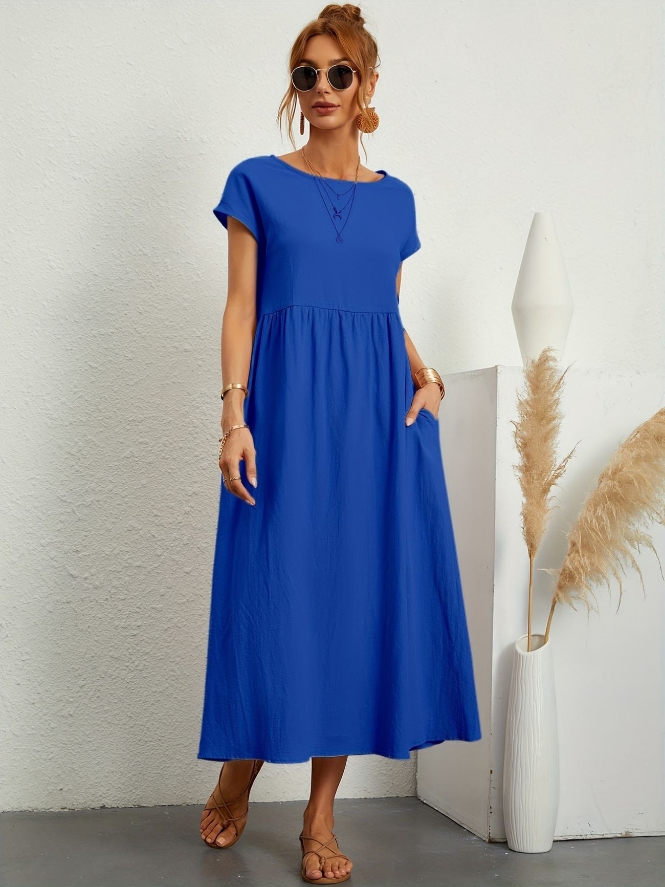 Royal blue midi casual dress with short sleeves and gathered waist, loose flared skirt